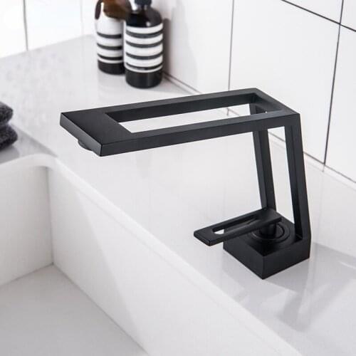 Luxury Bathroom Faucet Hollow design Bathroom Basin Faucet Cold & Hot Water Mixer Sink Tap Single Handle Deck Mounted Black Tap