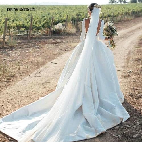 Charming Ball Gown Wedding Dresses 2021 Three Quarter Sleeves Bridal Gown Back Scoop Royal Train Simlpe White Plus Size Bride