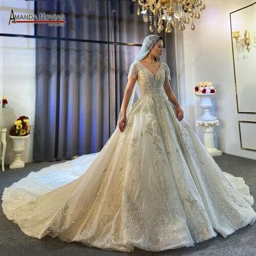 Special design short sleeves lace beading wedding dress A-line 2021