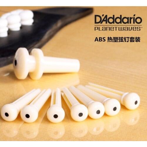 D'addario Planet Waves PWPS12 Injected Molded Bridge Pins with End Pin, Set of 7, Ivory with Black Dot