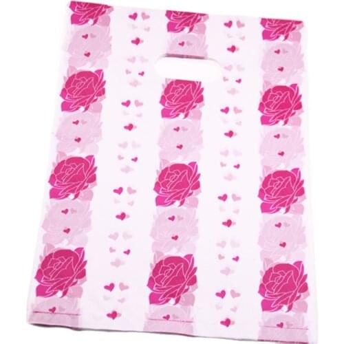 New Design Wholesale 100pcs/lot 25*35cm Clothing Gift Packaging Bags Luxury Rose Flower Large Plastic Shopping Bags With Handle