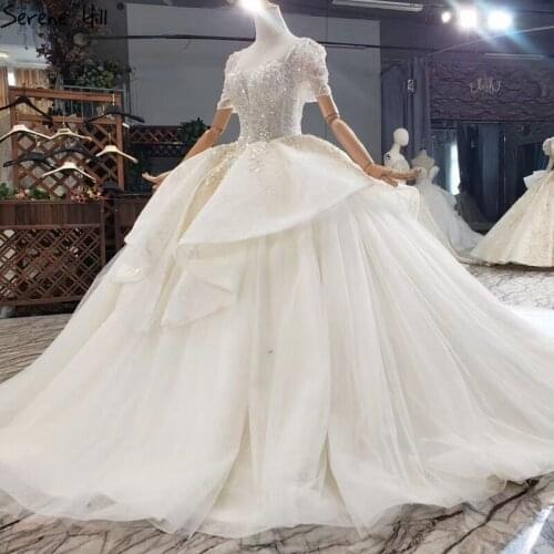 Dubai Ivory Luxury Short Sleeves Wedding Dresses 2020 High-end Ruffles Beading Sexy Bridal Gowns HX0266 Custom Made