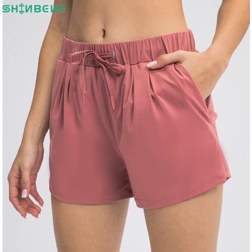 SHINBENE Low Waist Workout Gym Leisure Running Linerless Shorts Women Naked Feel Drawstring Training Fitness Sport Pocket Shorts