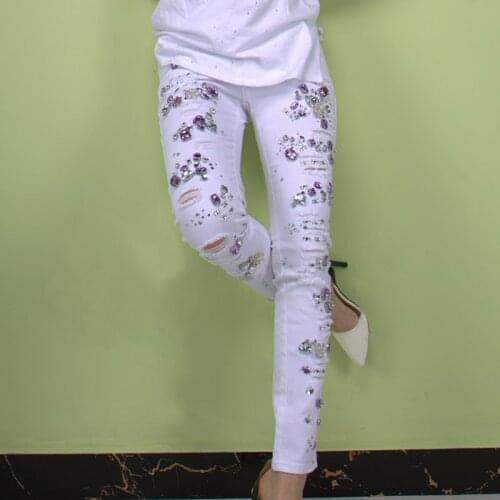 New Embroidered Flares Jeans Woman Fashionable White Hole Ripped Stretch Pencil Pants Diamond Casual Denim Trouser Female