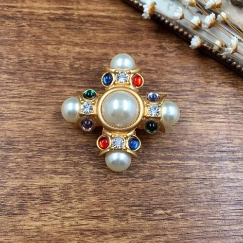 Antique matte pearl brooch