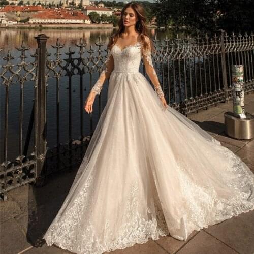 Luxury Illusion O-Neck Full Sleeve Embroidery Appliques Tulle Bridal Ball Gown Chapel Train Button Back Wedding Dress