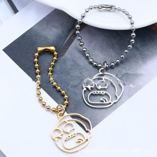 Fashion stainless steel keychain rings accessories hollow surprised avatar keychain bag car key chain holder jewelry pendant
