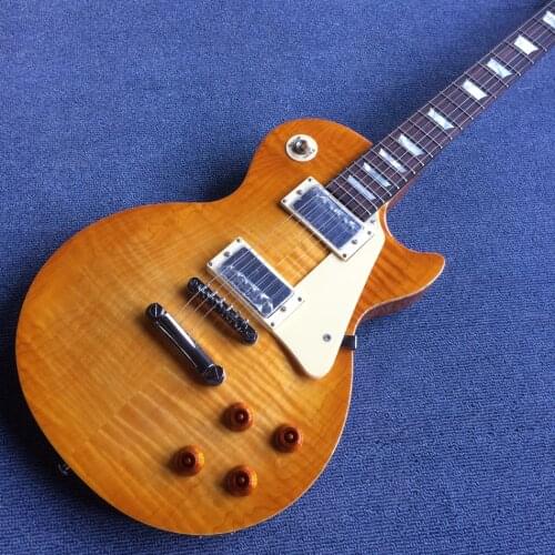 High-quality electric guitar, solid maple wood cover,Real Abalone inlay, one piece body & neck.free shipping