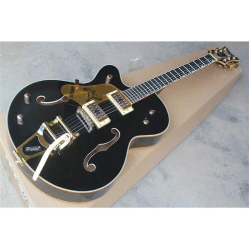 Double f hole big rocker left hand electric guitar, black gold powder wrapped special button, free delivery