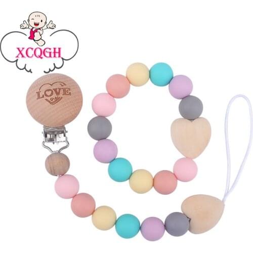 XCQGH 2Pcs/Set Dummy Chain Holder Baby Pacifier Nipple Clip and Teether Bracelet Set