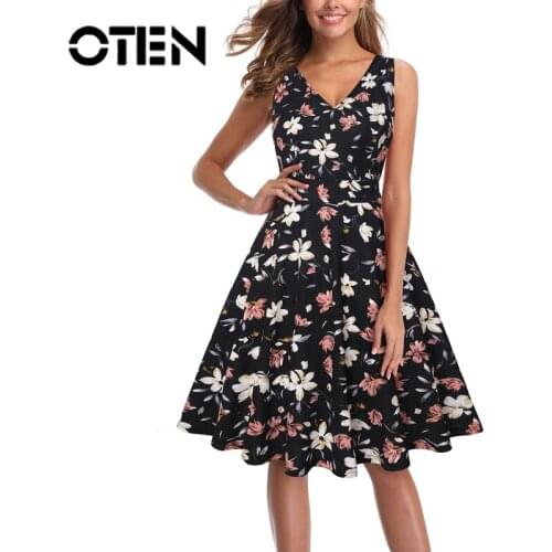 OTEN 2019 Summer Sleeveless Sexy Rock Party Dresses Women Vintage Floral Printed Sweet Retro V-Neck Femme A-Line Knee-Length