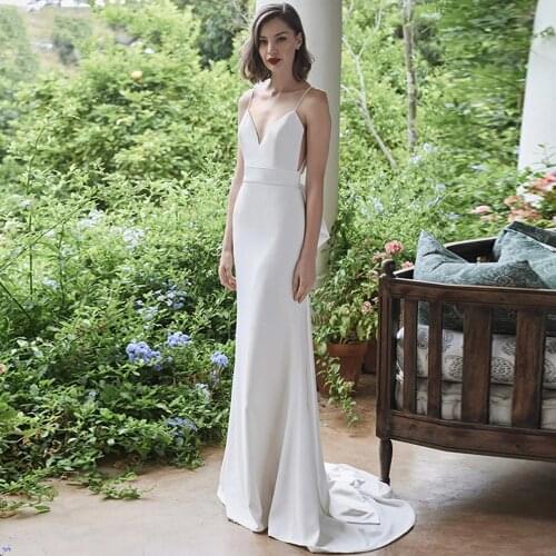Sexy Deep V-Neck Sleeveless Spaghetti Straps Boho Wedding Dress with Bow 2021 Sweep Trian Backless Bridal Gowns Robe De Mariée