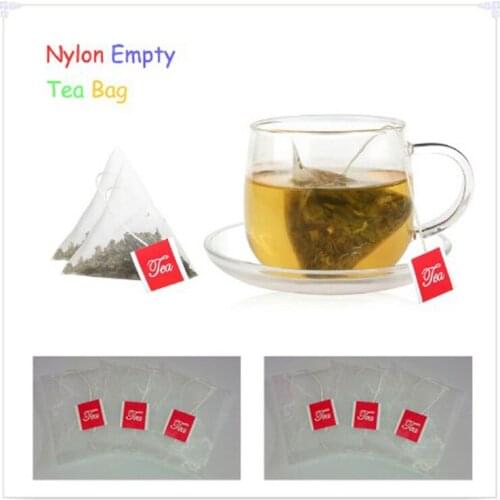 High Quality 1000pcs/lot Large Nylon Empty Pyramid Tea Bag Tea Infuser New Tea Strainer Teabags With the Tag 6.5 * 8cm