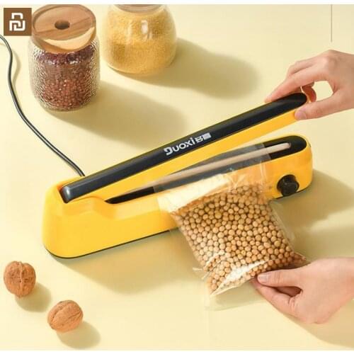 Youpin Hand pressure sealing machine plastic aluminum foil plastic sealing machine small food heat sealing machine household