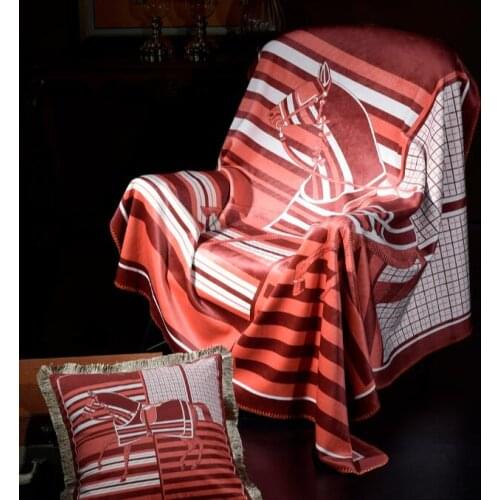 Ravenna Fleece Blankets On The Sofa
