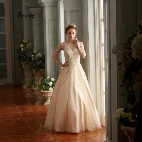 Finove 2019 Evening Dresses Light Champagne Tulle O-Neck Applique Beading Floor-Length Formal Long Dress A-Line Womens Dress