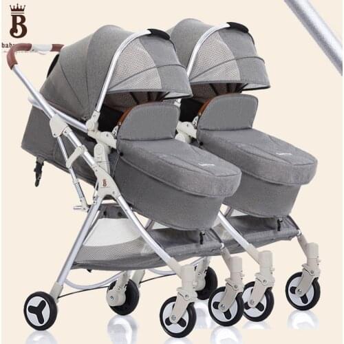 High landscape twin stroller can split the wheel shock absorber to sit and lie lightweight easy folding