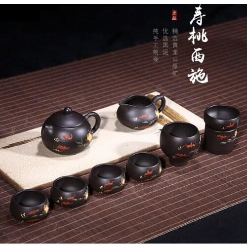 Undressed ore black mud peach xi shi pot set mud painting folk art by hand are recommended the teapot Tmall hot style