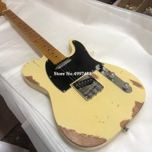 Gold relic electric guitar manual aging hardware nitrocellulose yellow, hand carved. Free shipping