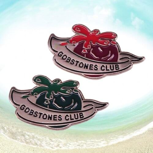 Wizarding game marbles enamel pin brooch winning stone squirts a foul-smelling putrid liquid into the losers face