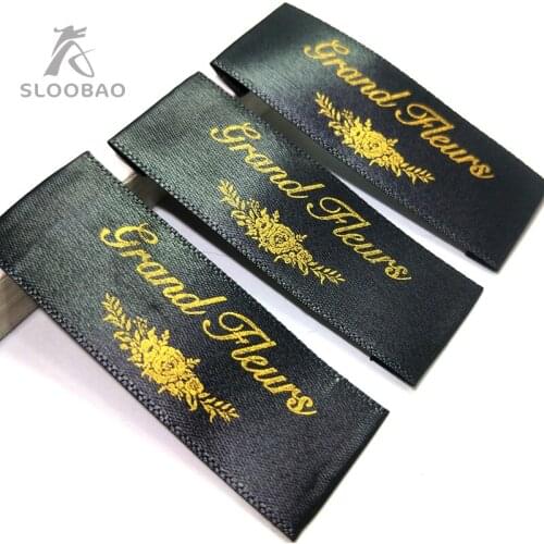 Silk screen ribbon label manufacturers custom-made clothing trademarks washed mark Black material printed gold logo MQQ 200pcs