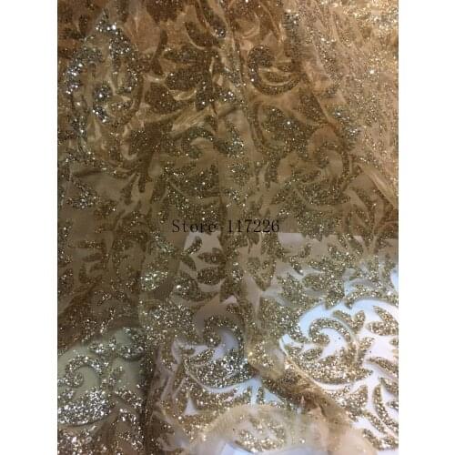 Top selling french african glued glitter sequence lace fabric in gold color sequin lace fabric for party dress JRB-92552