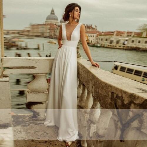 Sexy V-Neck Illusion Wedding Jumpsuit Ivory Satin Bride Gowns 2020 Backless A line Wedding Dresses Elegant Vestidos De Novia