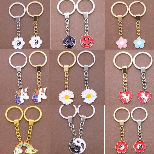 Smiley chrysanthemum unicorn rainbow yin and yang keychain new cute men and women backpack pendant fashion accessories