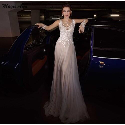 Magic Awn Vintage Long Sleeves Wedding Dresses Champagne Lace Appliques Illusion Princess A-Line Tulle Bride Gowns Backless Robe