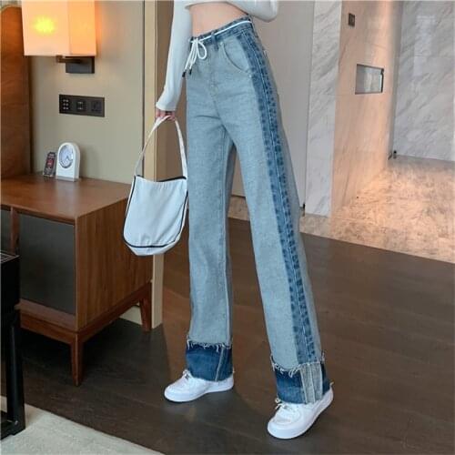 Fashion stitching drape curled straight leg trousers womens autumn 2021 new large size high waist loose raw edge wide leg jeans