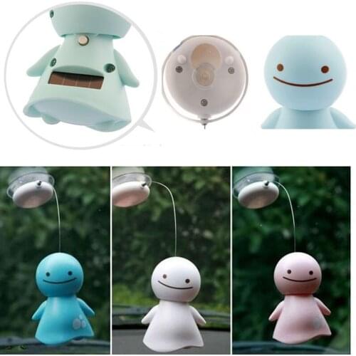 Drop Shipping Figurines Miniatures Christmas Gift Mini Solar Smile Sunny Doll Solar Toy Baby Doll