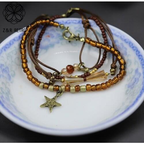 Vintage Beaded Bracelet & Bangles 2021 Fashion 4 Layer Suspension Star Pendant Trend Costume Jewelry for Women Unusual Things