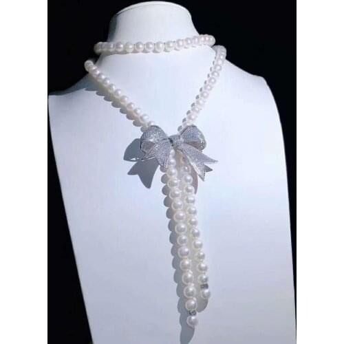Womens fashion jewelry micro inlaid zircon bow accessories 8-9mm freshwater pearl pendant necklace 95cm