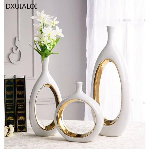 DXUIALOI Modern simplicity white vase decoration ceramic handicraft hollow artists living room flower arrangement vase decor