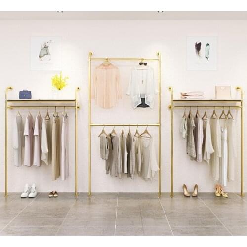 Display rack of clothing store clothes rack wall hanging rack for womens clothing store
