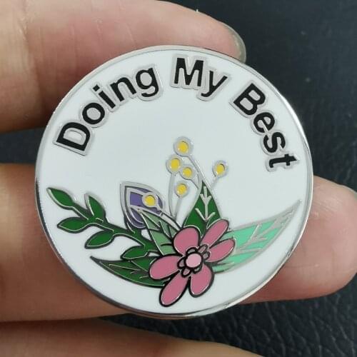 Positive flower brooches