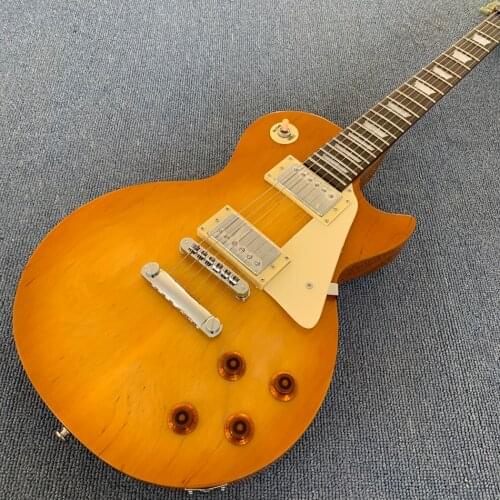 High-quality electric guitar, solid maple wood cover, mother-of-pearl inlay, tone-pro bridge, Good quality guitar.free shipping