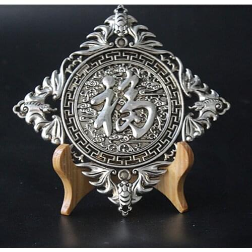 Una colección de adornos de bronce vintage adornos de plata dorados "adornos de animales de cuproníquel