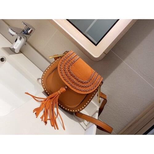 2021 spring female new style Korean style cowhide woven shoulder strap small fresh portable oblique solid color saddle bag retro