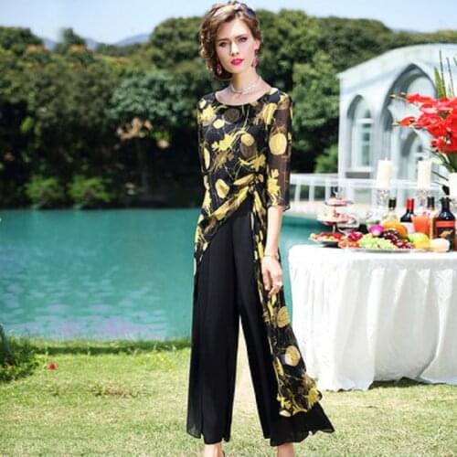 New 2021 O-neck Chiffon suit womens summer retro print fashion irregular top with loose wide leg two piece set trousers