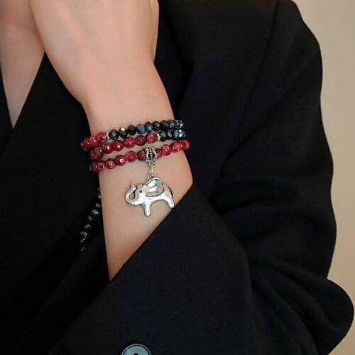 2021 Korean Red Crystal Beaded Girls Party Bracelets Fashion Chic Metal Elephant Hollow Heart Pendant Bracelet For Women Jewelry