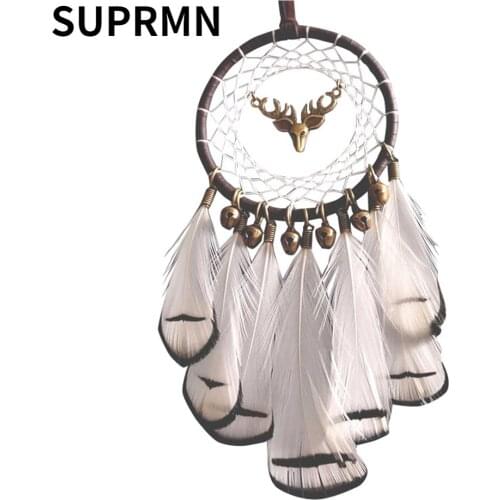 Indian dream catcher ornaments wind chimes inside the car indoor car pendant feather girl heart forest energy catcher net