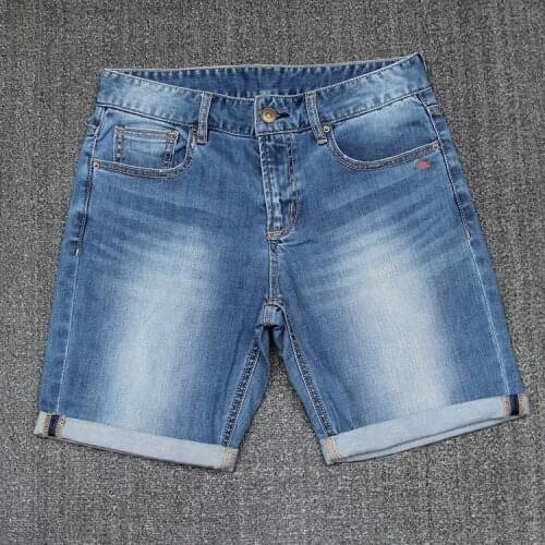 Summer women fashion straight style water wash embroidered hem rolled-up denim shorts lady trendy bleached jean casual bottom