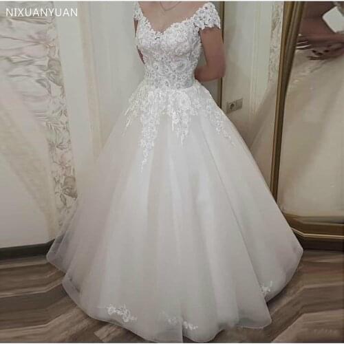 Tulle Wedding Dress with Lace Appliques Sweep Train Illusion Back Covered with Button Sleeveless Custom Made