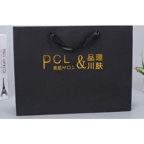 HIgh End Custom Gold Hot Foil Logo Die Cut Handle Black Paper Gift Bag With Ribbon Bow,gift paper bags with ribbon --XP2036