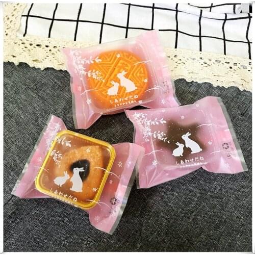 Scrub Korean version of rabbit machine seal cow rolling biscuit bag egg yolk moon cake packaging bags +gold tray 95-100 sets