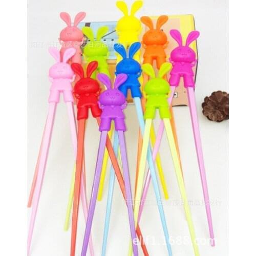 Free shipping 500 pair Children Kids Baby Beginner Cartoon Style Easy Fun Learning Training Helper Chopsticks Random Color