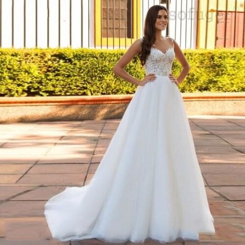 Elegant Sleeveless A-Line Tulle Wedding Dresses Appliques with See Through Neckline 2020 Bridal Gowns Floor Length