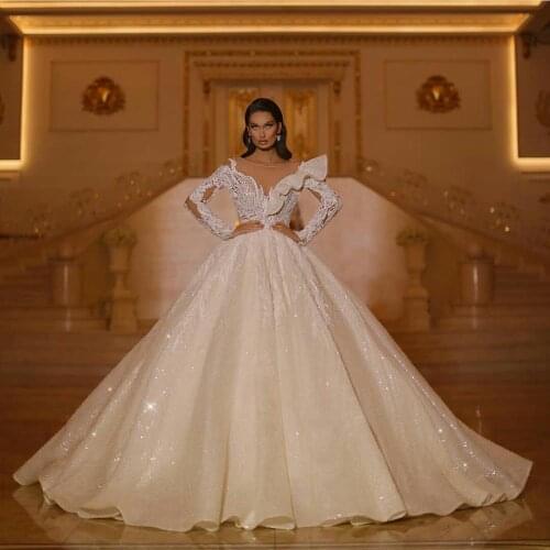 Luxury Sparkly Ball Gown Wedding Dresses Sheer O Neck Long Sleeve Bridal Gowns Lace Appliques robes de mariée