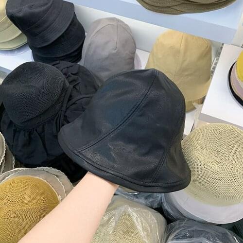 202107-shenjing new autumn waterproof Fashion curve stitching solid pu faux leather bucket cap men women leisure hat